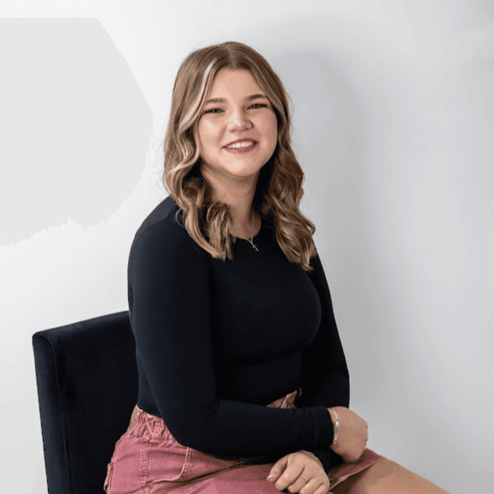 Portrait of Addisyn Bacon, a professional stylist at Revive Hair Salon & Day Spa, showcasing their expertise and style.