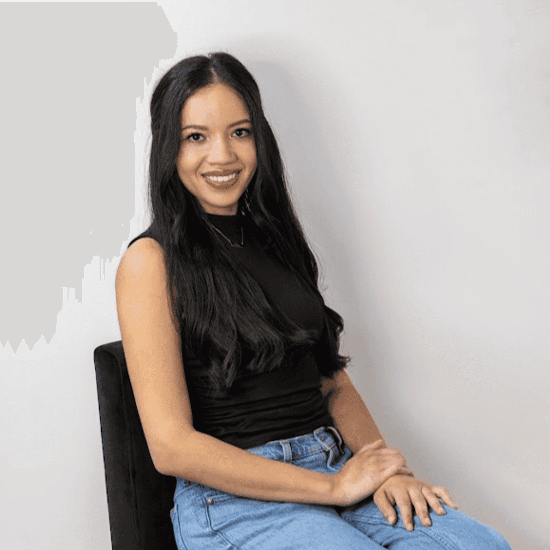 Portrait of Kendy Viera, a professional stylist at Revive Hair Salon & Day Spa, showcasing their expertise and style.