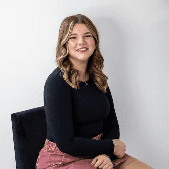 Portrait of Addisyn Bacon, a professional stylist at Revive Hair Salon & Day Spa, showcasing their expertise and style.