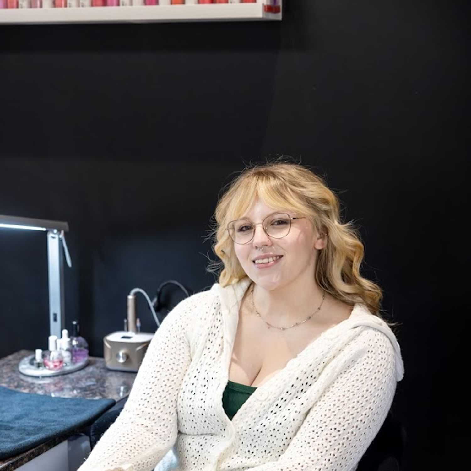 Portrait of Emma Yaple, a professional stylist at Revive Hair Salon & Day Spa, showcasing their expertise and style.