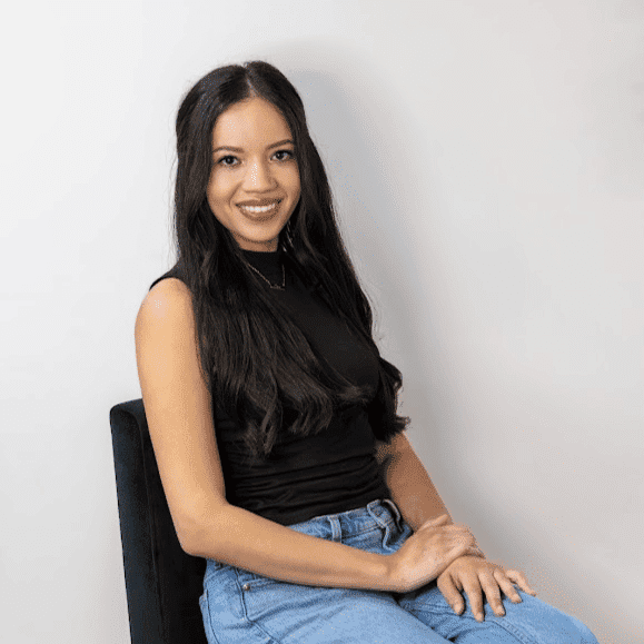 Portrait of Kendy Viera, a professional stylist at Revive Hair Salon & Day Spa, showcasing their expertise and style.