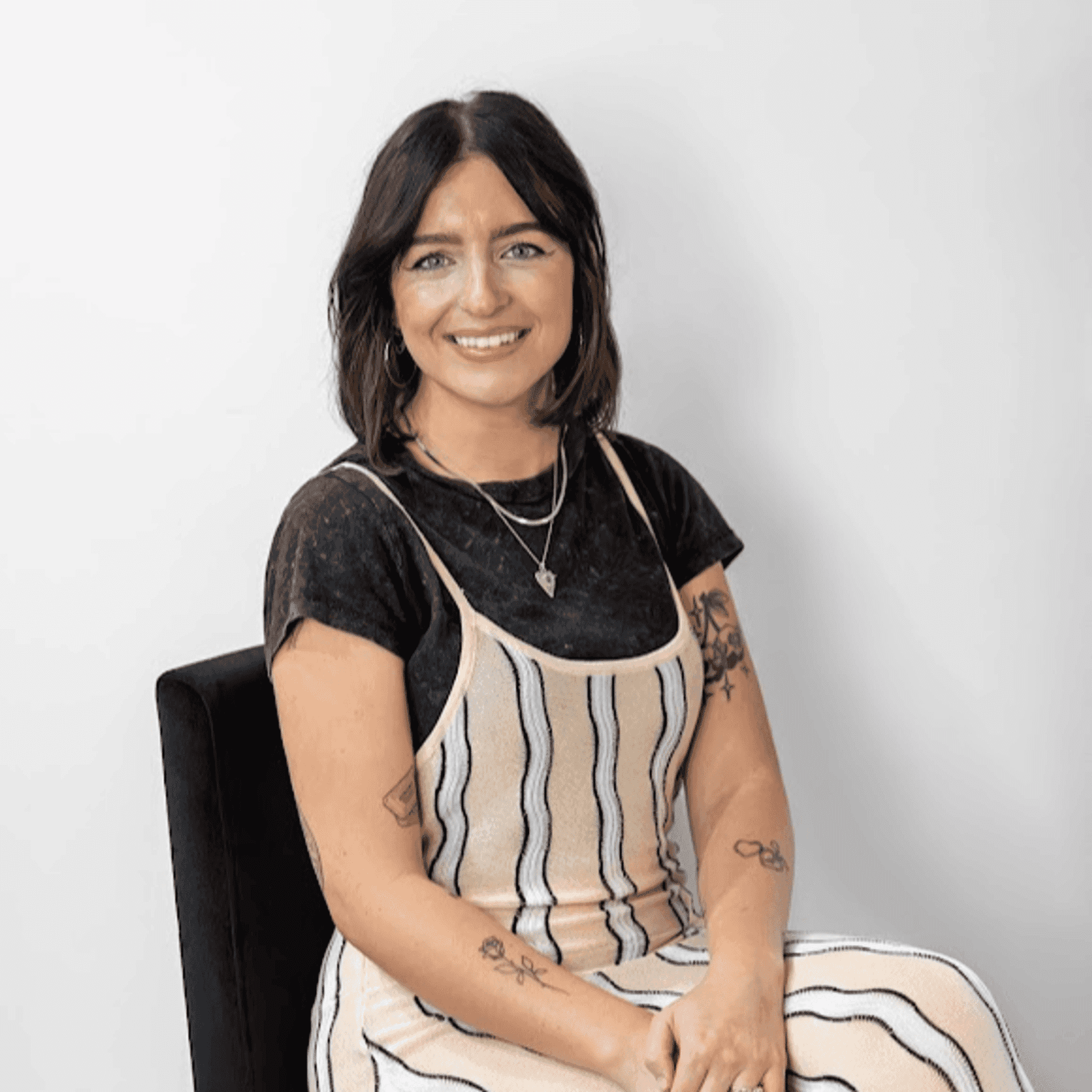 Portrait of Nicolette Oakley, a professional stylist at Revive Hair Salon & Day Spa, showcasing their expertise and style.