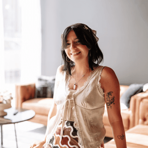 Portrait of Nicolette Oakley, a professional stylist at Revive Hair Salon & Day Spa, showcasing their expertise and style.