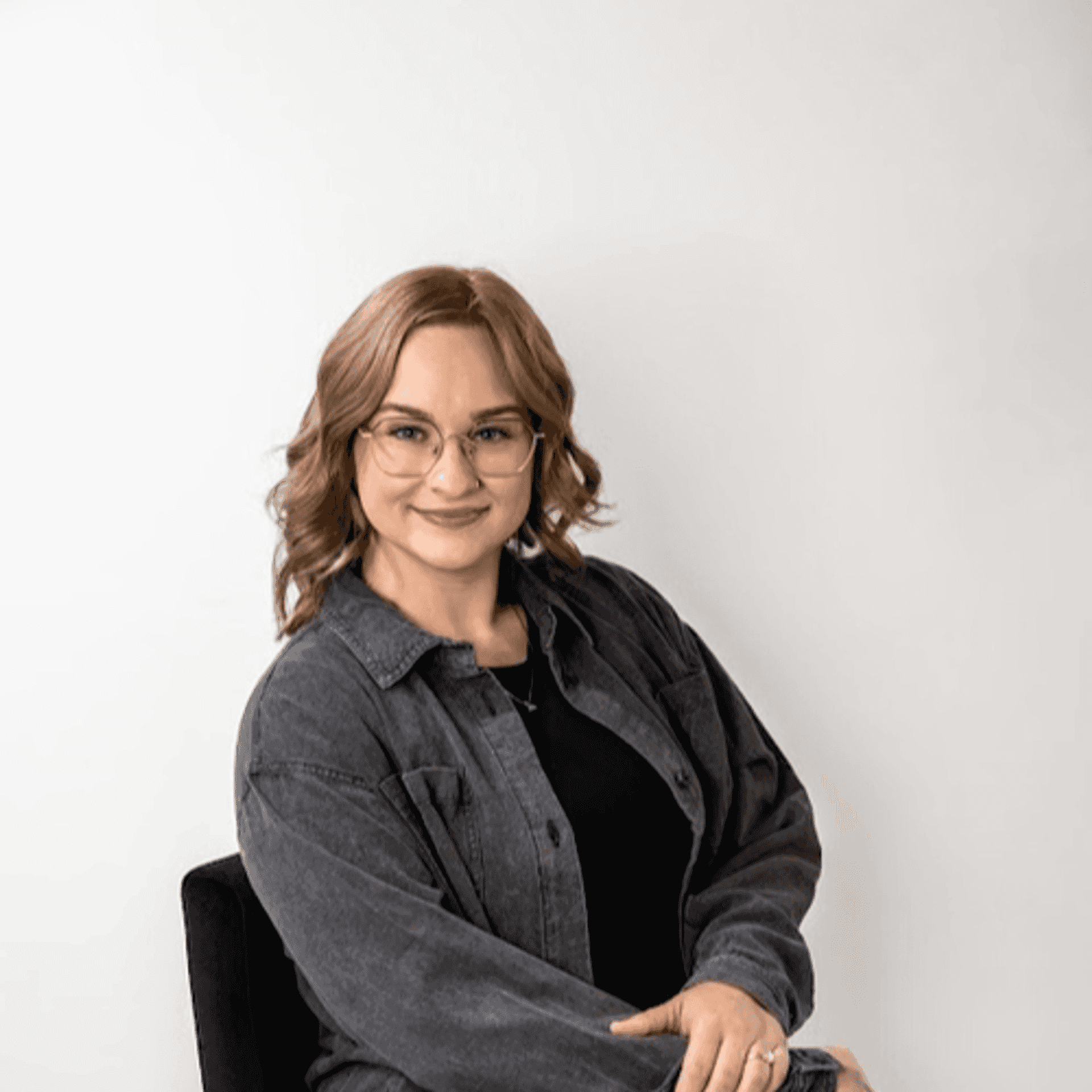 Portrait of Leah Epley, a professional stylist at Revive Hair Salon & Day Spa, showcasing their expertise and style.